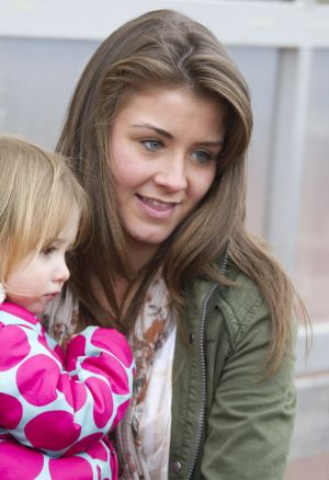 Gavin Blyth Memorial Cup Feb 19 2011 Brooke Vincent cuddles Jack Shepherds Daughter 2 year old Nyla image 3 sm.jpg